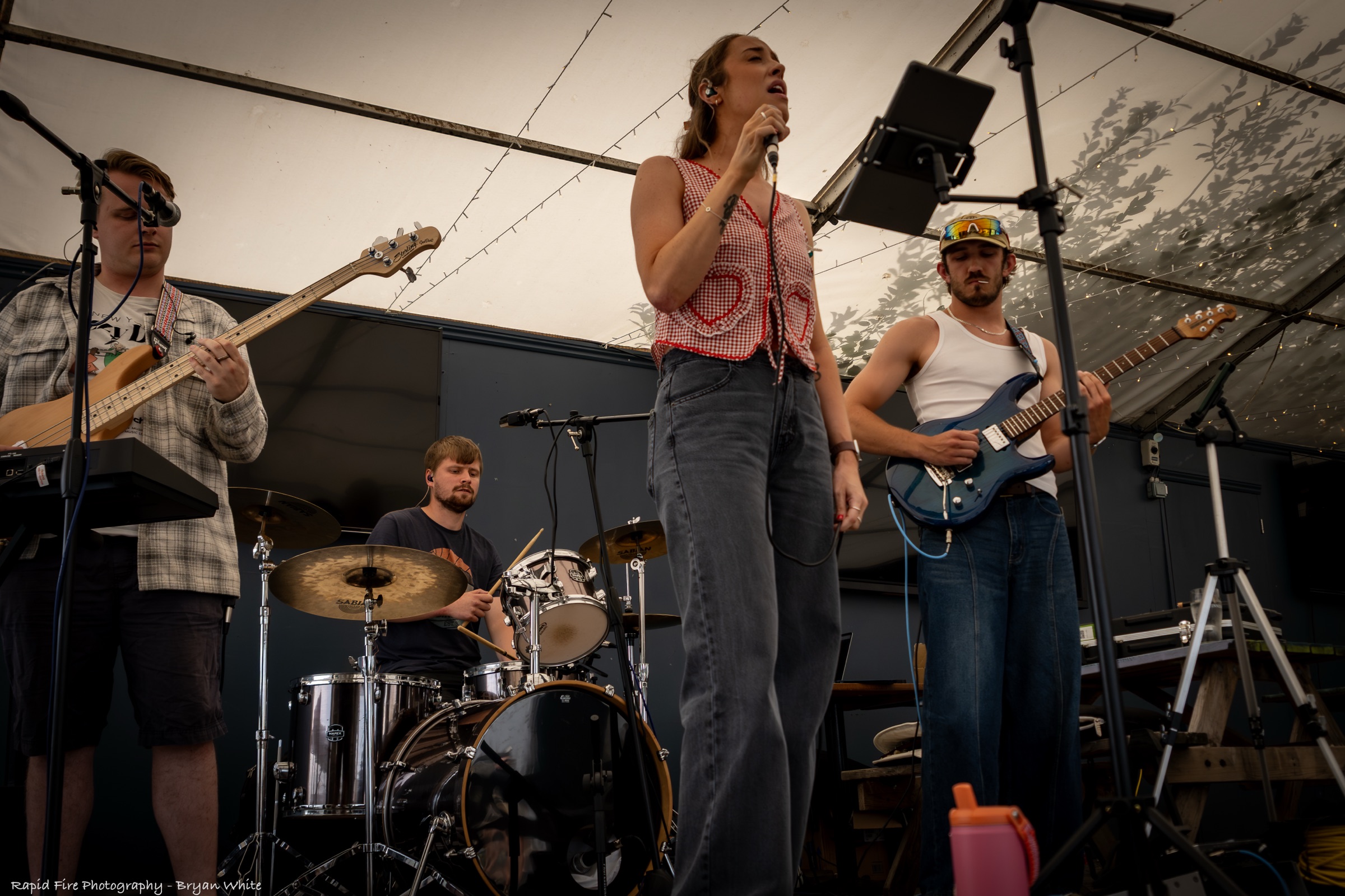 Richard Jones performing live guitar with a band